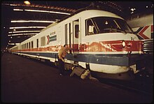 An RTG Turboliner at Union Station, St. Louis, in the 1970s LAST MINUTE CHECK OF THE ENGINE OF THE AMTRAK TURBOLINER PASSENGER TRAIN IS MADE BEFORE DEPARTURE FROM ST. LOUIS... - NARA - 556059.jpg