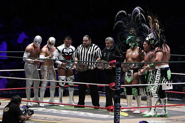 Champions Los Guerreros Lagunero (right) and challengers Carístico, Místico, and Volador Jr. (left) before a match in November 2018.