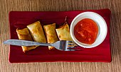 Smaller size deep fried lumpia served with sambal hot sauce, sold as a snack in Purwokerto Train Station, Central Java Lumpia at Teh Jawa, Purwokerto Station, Purwokerto 2015-03-20.jpg