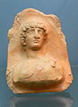 Museum Lauriacum: Antefix ( 2./3.Jhdt ) mit Relief eines Satyrs.