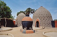 The homes of the Musgum, in the Far North Region, are made of earth and grass. Maison obus.jpg