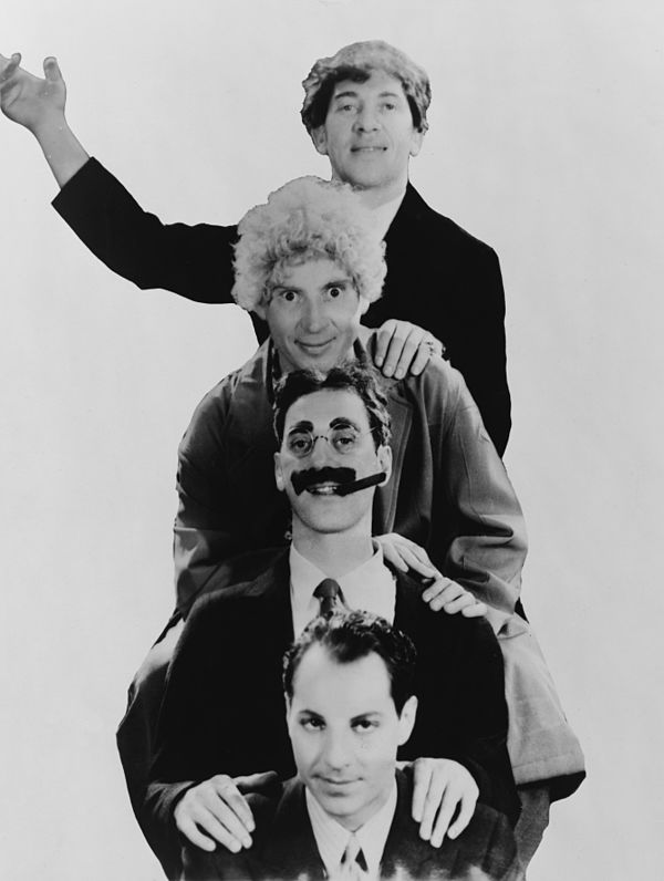 Four of the five Marx Brothers in 1931 (top to bottom: Chico, Harpo, Groucho and Zeppo)