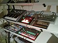 Music shelf on Studio - Novation LauchPad, Korg Volca Bass, Arturia Minibrute, Roland AIRA TB-3 Touch Bassline, Cyclone Analogic Bass Bot TT-303, Korg Voca Keys, Korg Electribe MX (EMX-1), Roland AIRA TR-8 Rhythm Performer (by David J).jpg