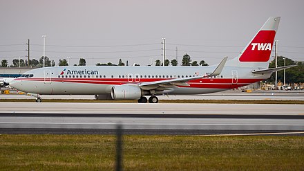 The American Airlines Boeing 737-800 in TWA heritage livery (registered N915NN) is shown here taxiing to the American Airlines terminal at Miami International Airport in February 2017, more than 16 years after TWA proper ceased to exist