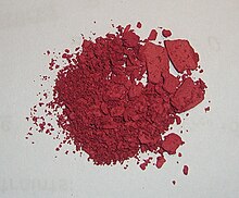 Powdered bis(dimethylglyoximate)nickel. This coordination compound can be used for the gravimetric determination of nickel. Ni(dmg)2.JPG