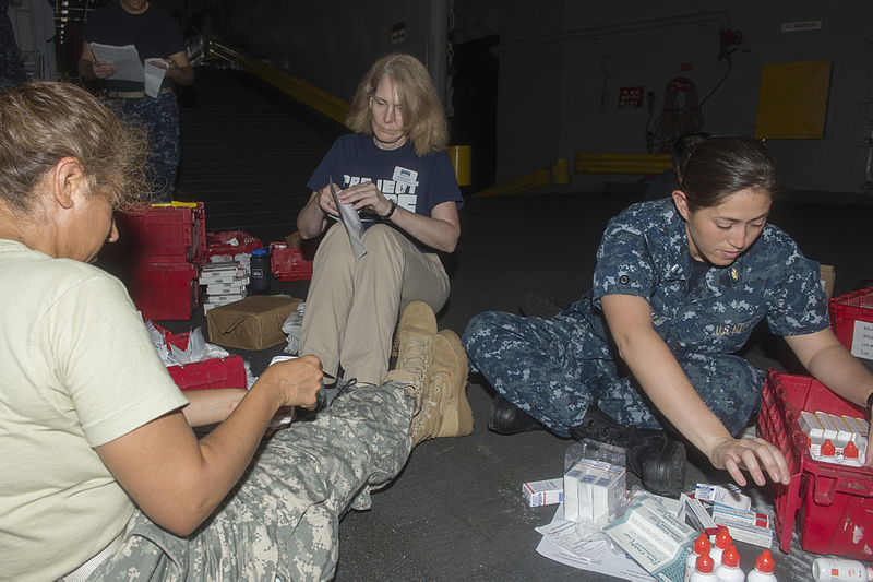 File:Nongovernmental organization volunteers and U.S. Navy and Army medical personnel sort medications aboard the amphibious dock landing ship USS Pearl Harbor (LSD 52) during Pacific Partnership 2013 in Apia, Samoa 130603-N-SP369-009.jpg