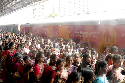 People, especially women, visiting the Red Ribbon Express on a tour of India promoting AIDS awareness when it arrived in Chennai in 2012