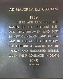 Photo of plaque between panels at the Lae Memorial at the Lae War Cemetery Plaque between panels at the Lae Memorial at the Lae War Cemetery.jpg