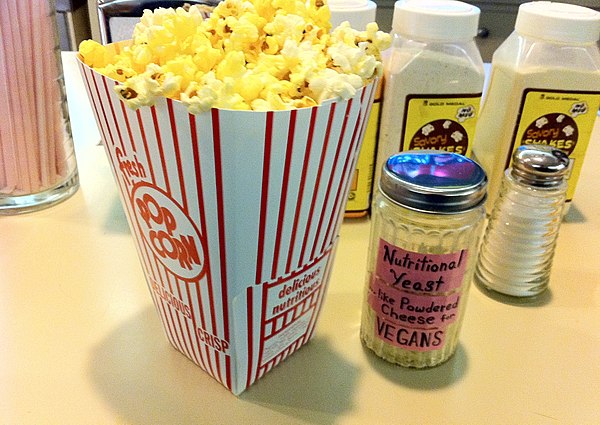 Some theatres offer visitors nutritional yeast for popcorn seasoning.