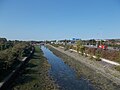 Portsbridge Creek scheidt Portsea Island (links) van het vasteland (rechts)