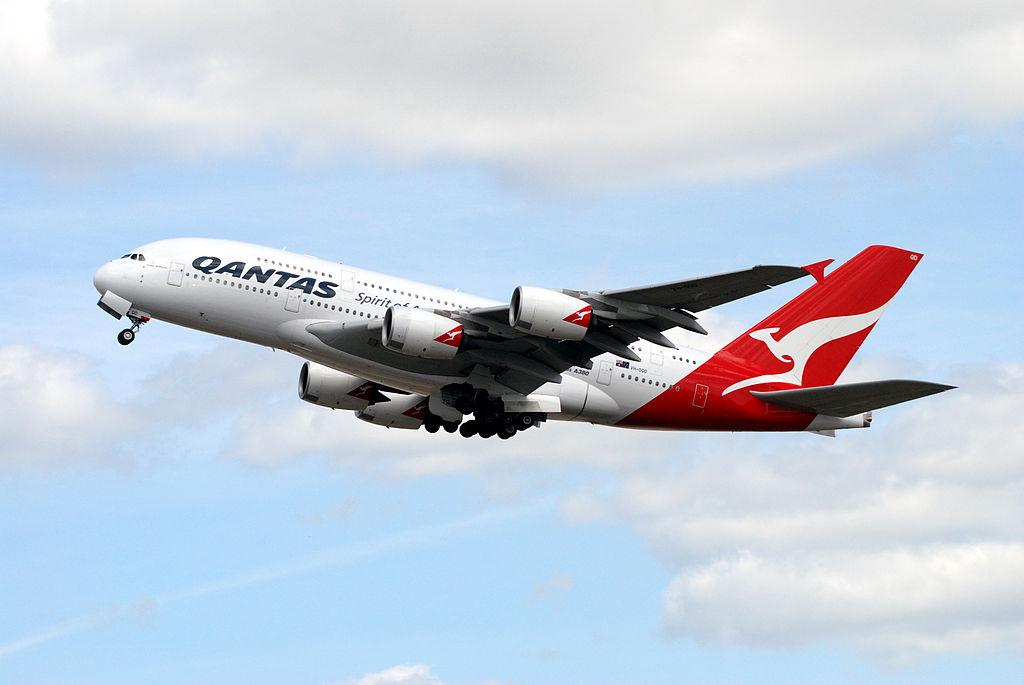 File:White and Red Qantas Airplane Fly High Under Blue and White  Clouds.jpeg - Wikimedia Commons