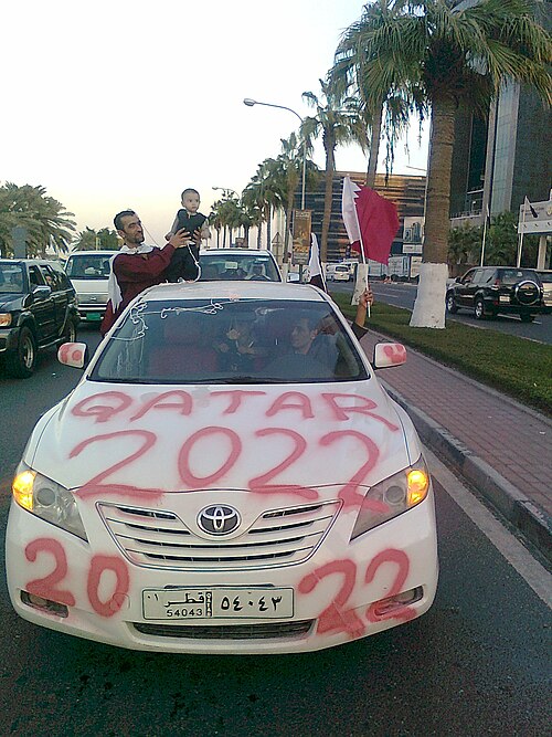 Qataris celebrate in Doha after winning the hosting of the 2022 World Cup.