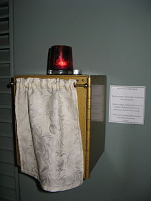 A tabernacle at Mikael Agricola Lutheran Church in Helsinki, juxtaposed with a chancel lamp and note about the real presence Reaalipreesens.jpg