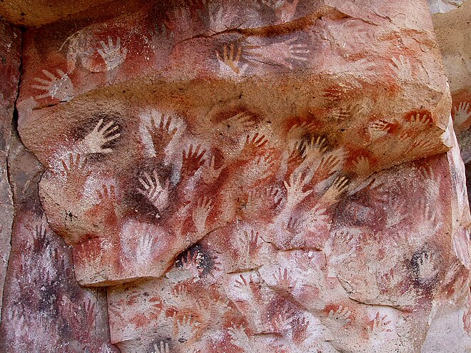 Cueva de las Manos, Perito Moreno, Argentina. The art in the cave is dated between 7,300 BC and 700 AD,[a] stenciled, mostly left hands are shown.[3][4]