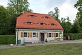 Individual monument of the entity Schlossberg Planitz: residential house, formerly Fronfeste, then coach house of Schloss Planitz