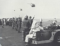 Sea Stallions returning from the DAO Compound approach USS Midway