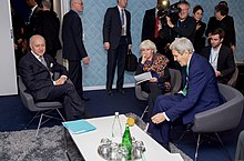 Tubiana with John Kerry and Laurent Fabius, 7 December 2015 Secretary Kerry Meets with French Foreign Minister Fabius and Climate Change Advisor Tubiana (23217275059).jpg