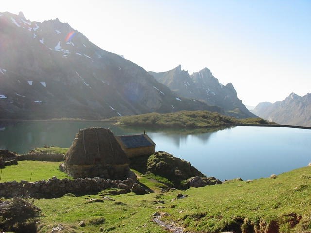 Picture of ḷḷagu del Vaḷḷe (Somiedo), showing typical Asturian cottages (called teitos), as already in use in the time of the Astures