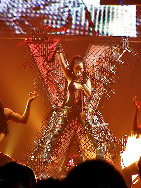 Aguilera (pictured) performing "Genie in a Bottle" on The Stripped Tour in 2003