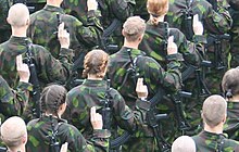Finnish female soldiers swearing their military oath alongside male conscripts. Suomalaisia naissotilaita vannomassa sotilasvalaa.jpg