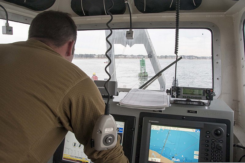 File:U.S. Navy Boatswain's Mate 1st Class Jordan McKeel, assigned to Amphibious Construction Battalion 2, acts as craftmaster during an operation to tow a Coast Guard channel marker buoy off of a public beach 131022-N-IM663-013.jpg