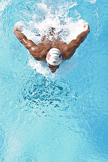 Overhead shot of a swimmer performing the butterfly stroke US Marines butterfly stroke.jpg