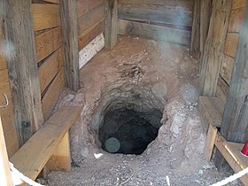 Inside of the entrance of the gold mine shaft.