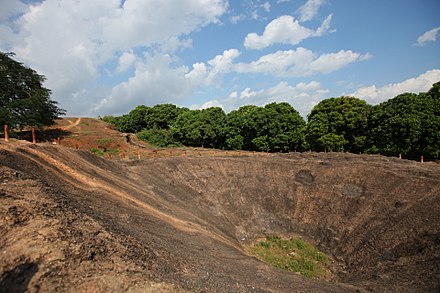 The massive explosion crater at the top of Eliane 2, created by Viet Minh sappers who successfully blew up the fortified outpost during the battle.