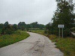 Road sign leading to the village