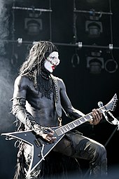 Guitarist Wes Borland is known for his visual performance style, and often performs wearing costumes or body paint. 13-06-09 RiP Limp Bizkit Wes Borland 1.JPG