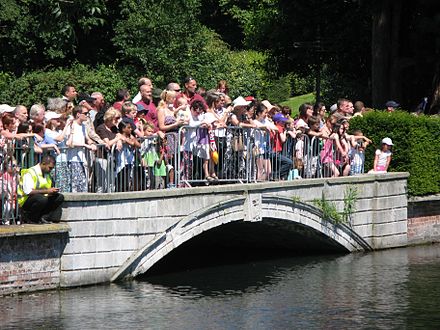 Spectators on the Leoni Bridge at the 2012 Olympic torch relay in Carshalton Village