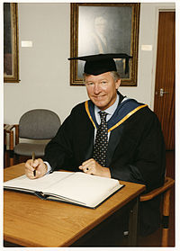 Ferguson receiving an honorary degree from Salford University in 1996 Alex Ferguson receiving honorary degree 1996.jpg