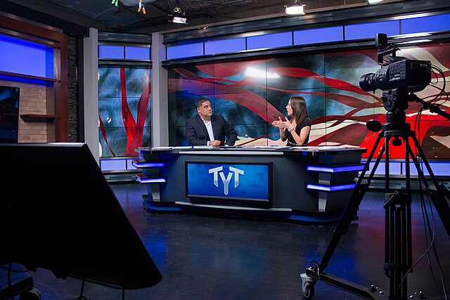 Cenk Uygur (left) and Ana Kasparian (right) presenting a show on June 23, 2015