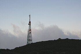 Vista del trasmettitore di picco Textor al tramonto.