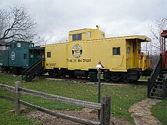 Each caboose was restored to become a hotel suite. Antlers yellow caboose.jpg