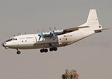 A Click Airways Antonov An-12BP landing at Sharjah International Airport, United Arab Emirates in 2007. Antonov An-12BP, Click Airways AN1294886.jpg