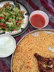 Machbous, the national dish of Qatar Arabic Chicken Kofta Rice with Grilled Chicken.jpg