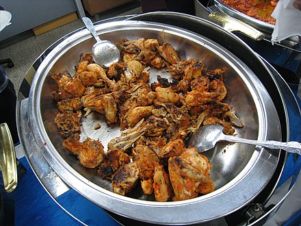 Ayam bakar bumbu rujak, served in a buffet