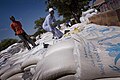 Bags of food aid, donated by the Australian Government, are piled up at a food distribution point in Epworth, in Harare, Zimbabwe on 23 April 2009.