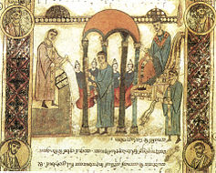 Encenser (baix-dreta), bisbe mitrat assegut en càtedra (dreta), diaca, o cantor, cantant l'Exultet sota baldaquí (centre). Exultet, s. XI