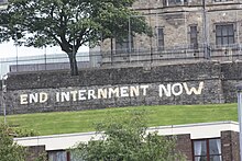 Modern anti-internment graffiti on Derry's Walls seen from the Bogside area of Derry. (August 2009) Bogside (12), August 2009.JPG