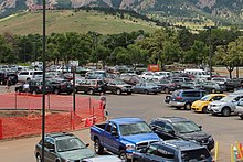 The King Soopers parking lot, where the shooting began (pictured 2016) Boulder King Soopers parking lot (Green Mountain - panoramio (2) (cropped)).jpg