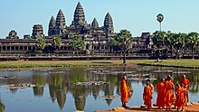 Buddhist monks in front of the Angkor Wat.jpg