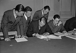 While newsmen take notes, Chairman Dies of House Un-American Activities Committee reads and proofs his letter replying to Pres. Roosevelt's attack on the committee, October 26, 1938