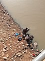 Children washing at a lakeside in Northern Ghana