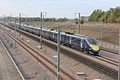 Class 395 train passes through the depot, coast bound.jpg