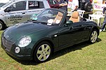 Daihatsu Copen circa 2001 with retracted hardtop, qualifying for the ultra-compact Japanese kei class