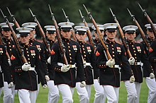 US Marines on parade, 2010 Defense.gov News Photo 100615-M-1549W-221 - U.S. Marines from Marine Barracks Washington march by during the pass and review portion of the Sunset Parade at the Marine Corps War Memorial in.jpg