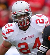 Reyes playing football for Stony Brook in 2012 Dominick Reyes (8041987143) (cropped).jpg