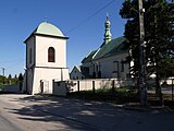 English: Saint Lawrence church and bell tower in Drugnia